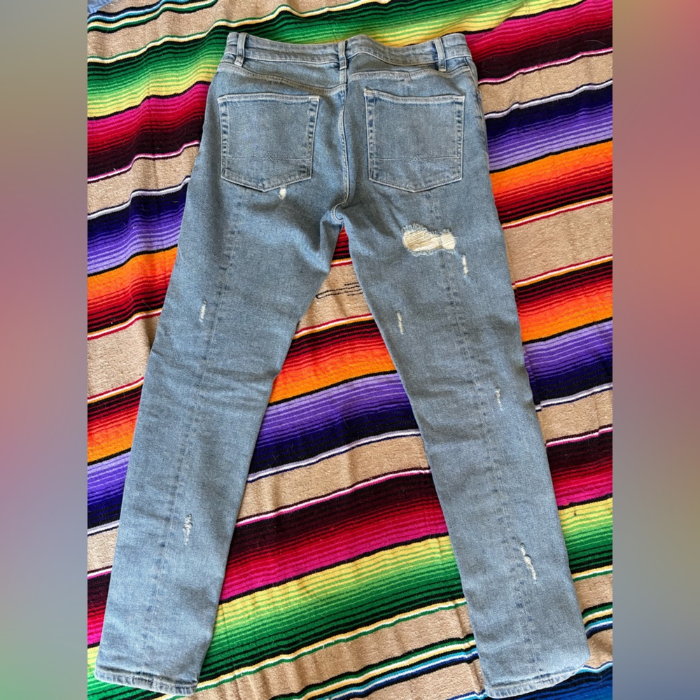 Men’s Distressed Light Blue Jeans